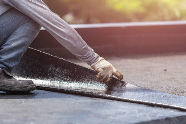 Professional Wet Basement Repair technician working in Roosevelt, NY